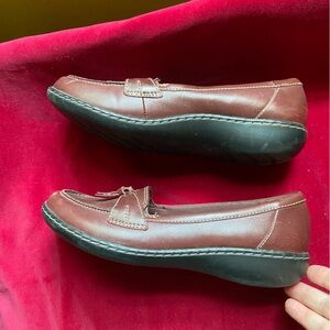 Clark’s Leather soft cushion flats w/ preppy tassels in oxblood. Lasts forever.